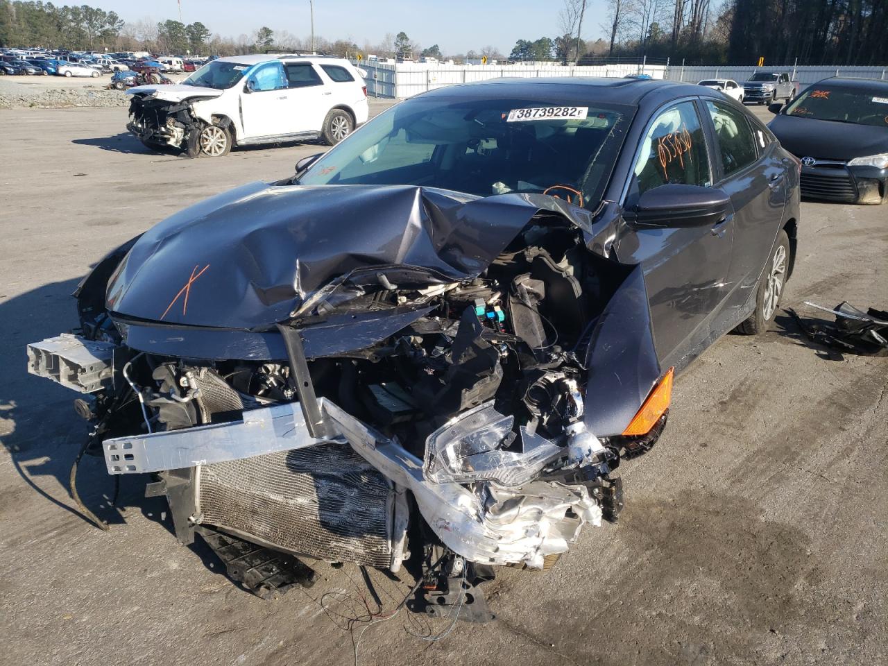 Photo 2 from auction – 2017 HONDA CIVIC EX with VIN 19XFC2F73HE205560