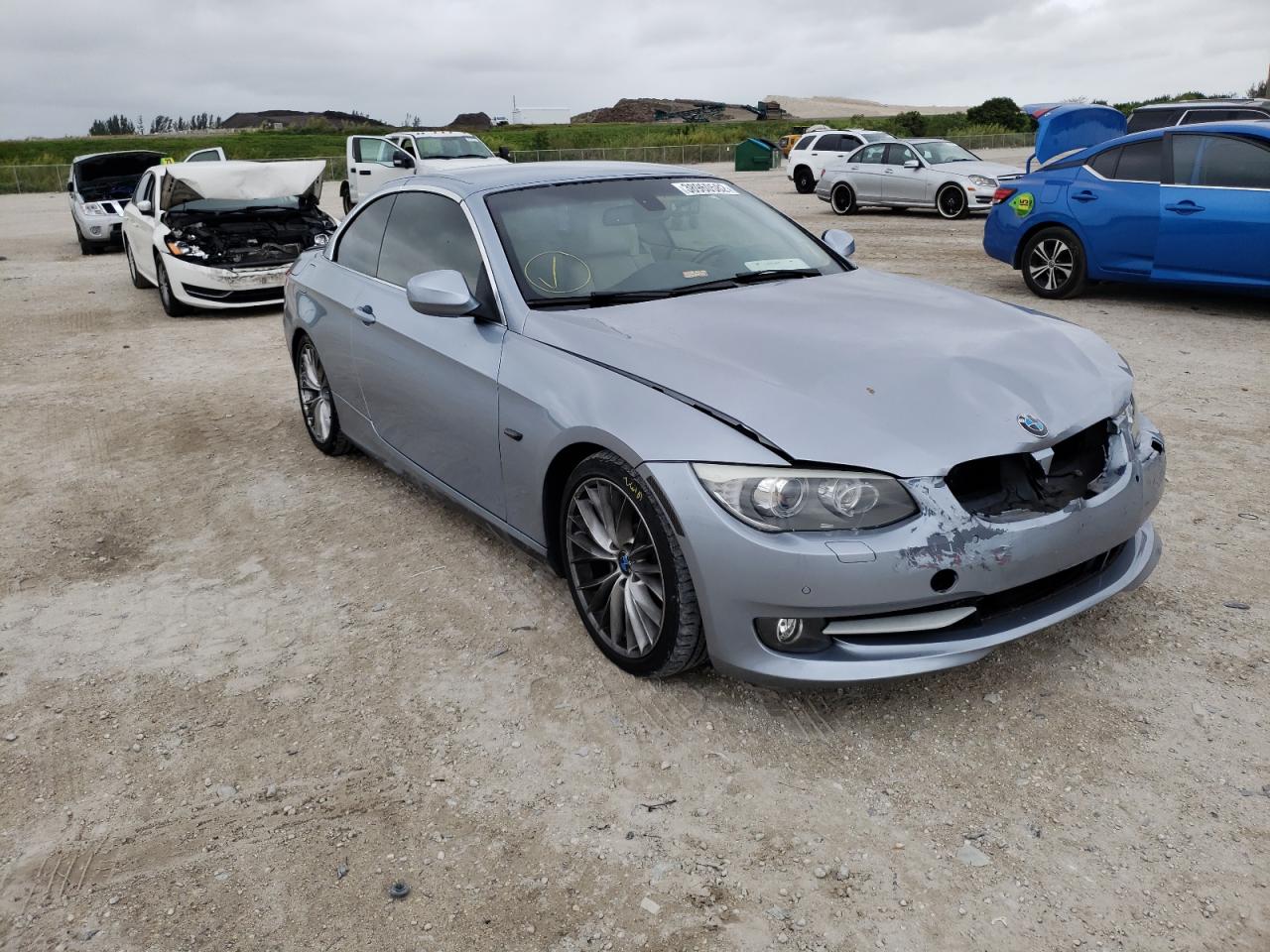 BMW 335 I 2011 with VIN WBADX7C57BE581402 - Photo from auction