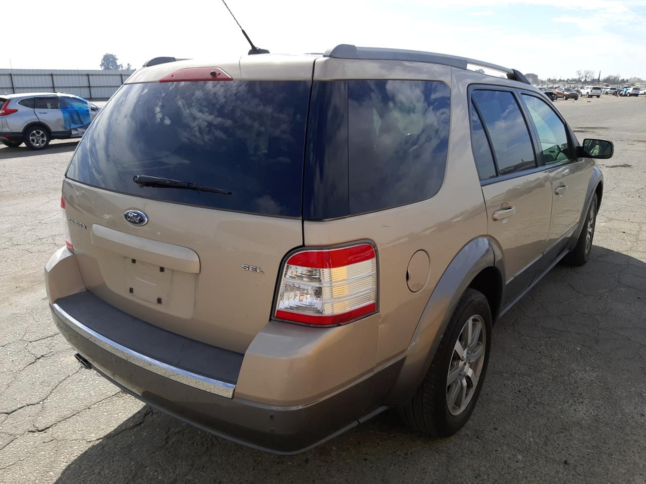 Photo 4 from auction – 2008 FORD TAURUS X S with VIN 1FMDK02W88GA29676
