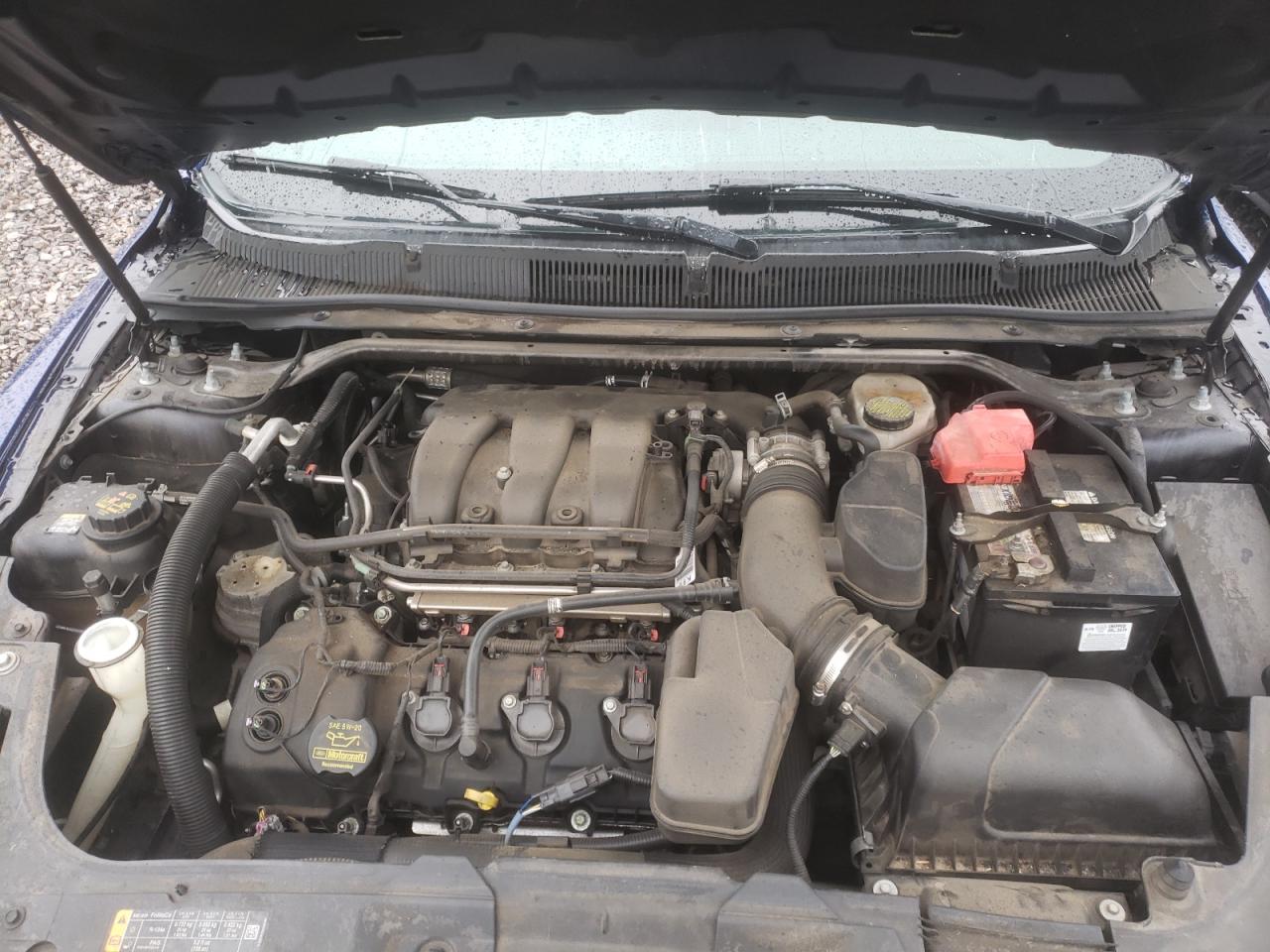Photo 7 from auction – 2013 FORD TAURUS LIM with VIN 1FAHP2F81DG235260