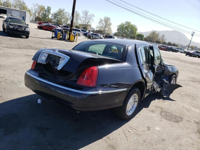 Photo 4 from auction – 2000 LINCOLN TOWN CAR E with VIN 1LNHM81W7YY914456