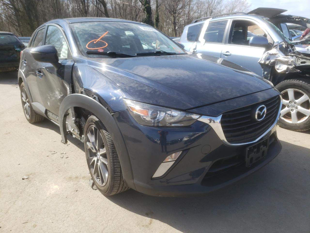 MAZDA CX-3 TOURI 2018 with VIN JM1DKFC70J0330262 - Photo from auction