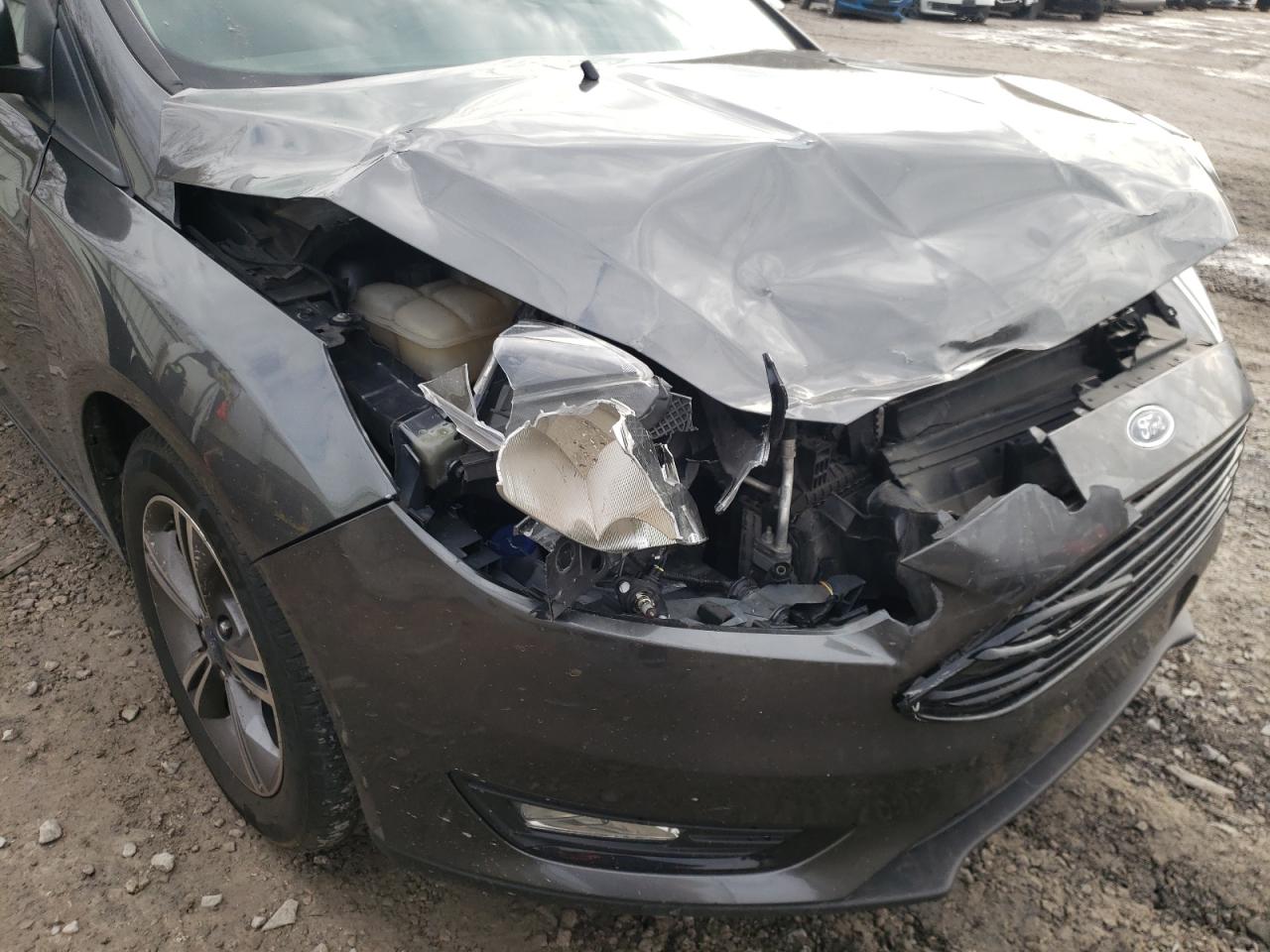 Photo 9 from auction – 2018 FORD FOCUS SE with VIN 1FADP3FEXJL235030