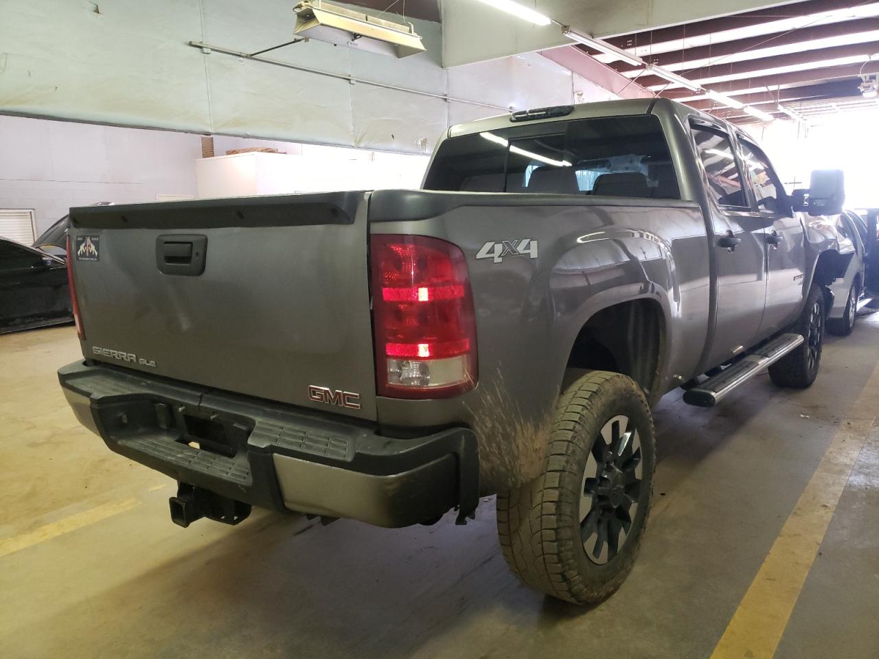 Photo 4 from auction – 2014 GMC SIERRA K25 with VIN 1GT120E83EF138925