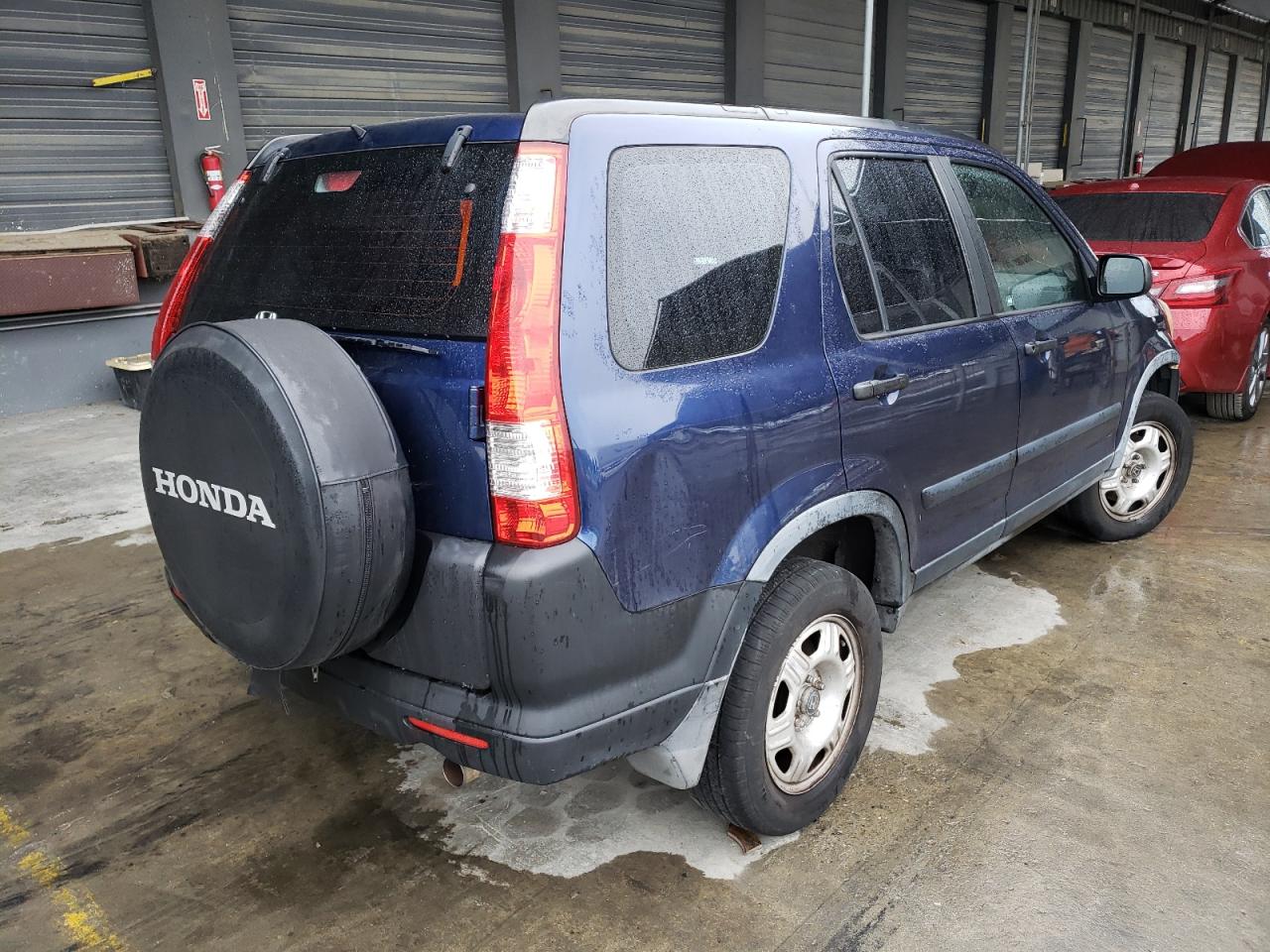 Photo 4 from auction – 2005 HONDA CR-V LX with VIN JHLRD68595C007634