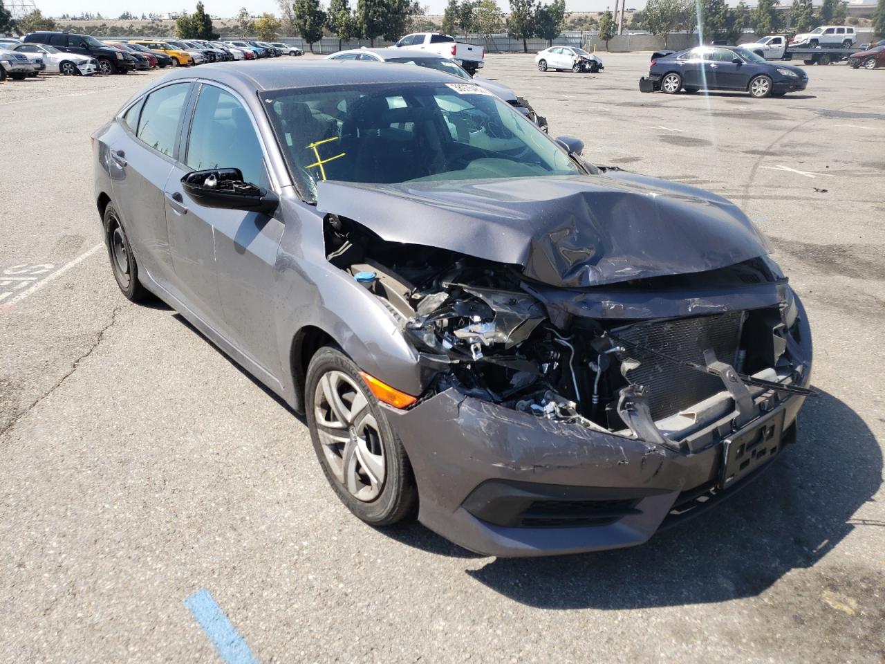 Photo 1 from auction – 2018 HONDA CIVIC LX with VIN 2HGFC2F54JH570372