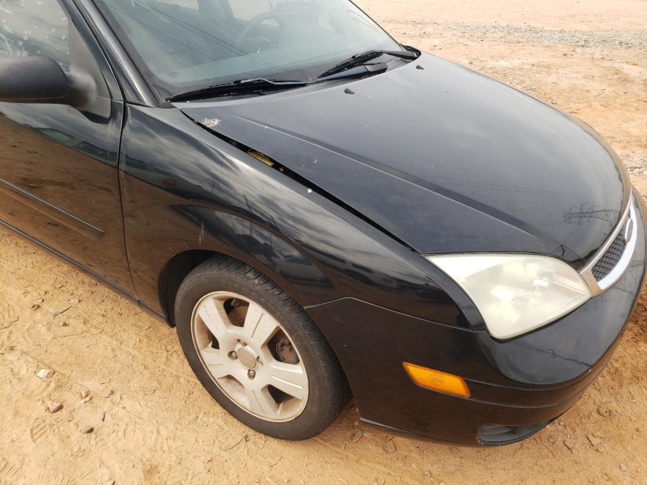 Photo 9 from auction – 2006 FORD FOCUS ZX5 with VIN 1FAHP37N16W244026