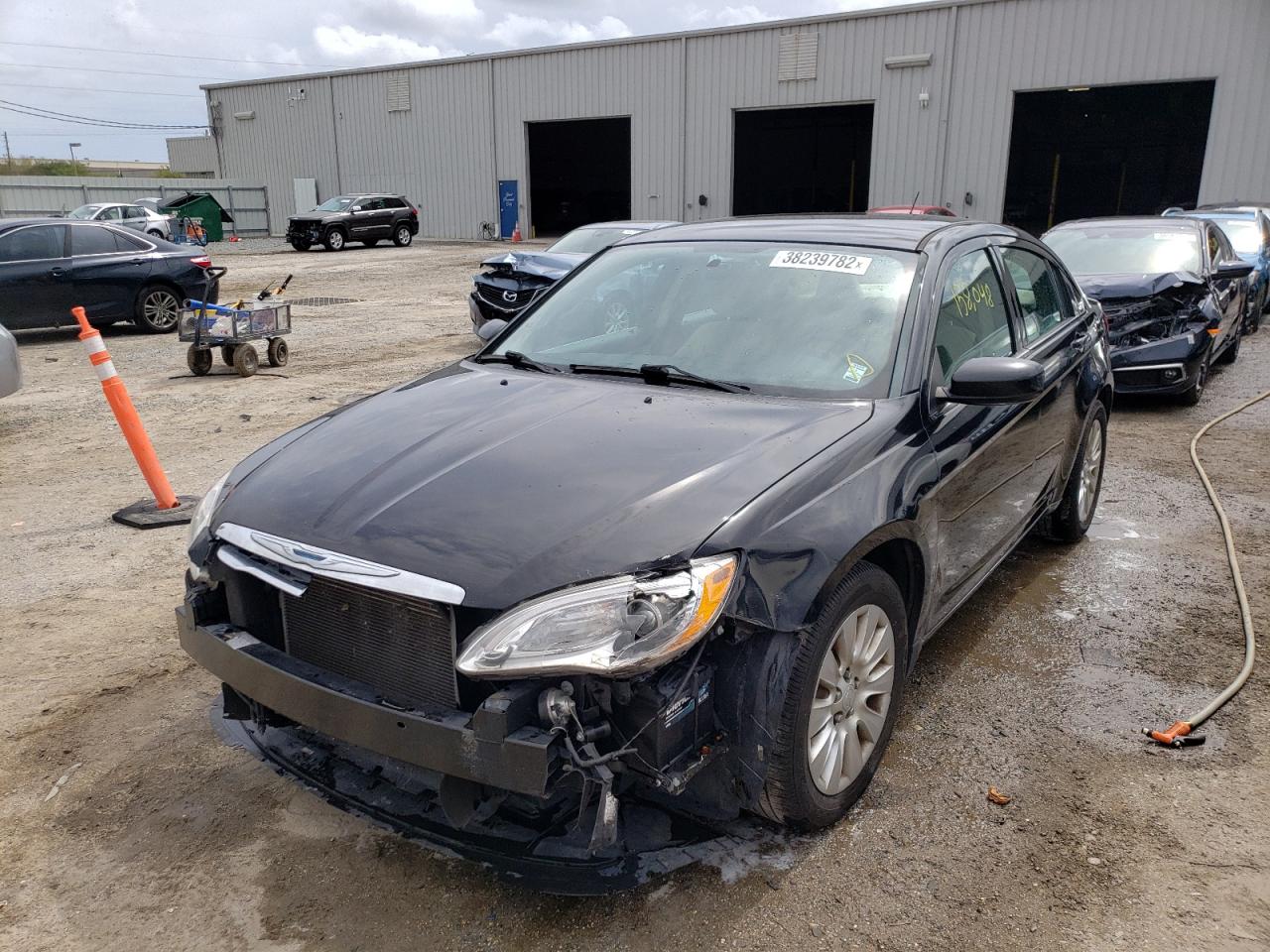 Photo 2 from auction – 2014 CHRYSLER 200 LX with VIN 1C3CCBAB4EN142267