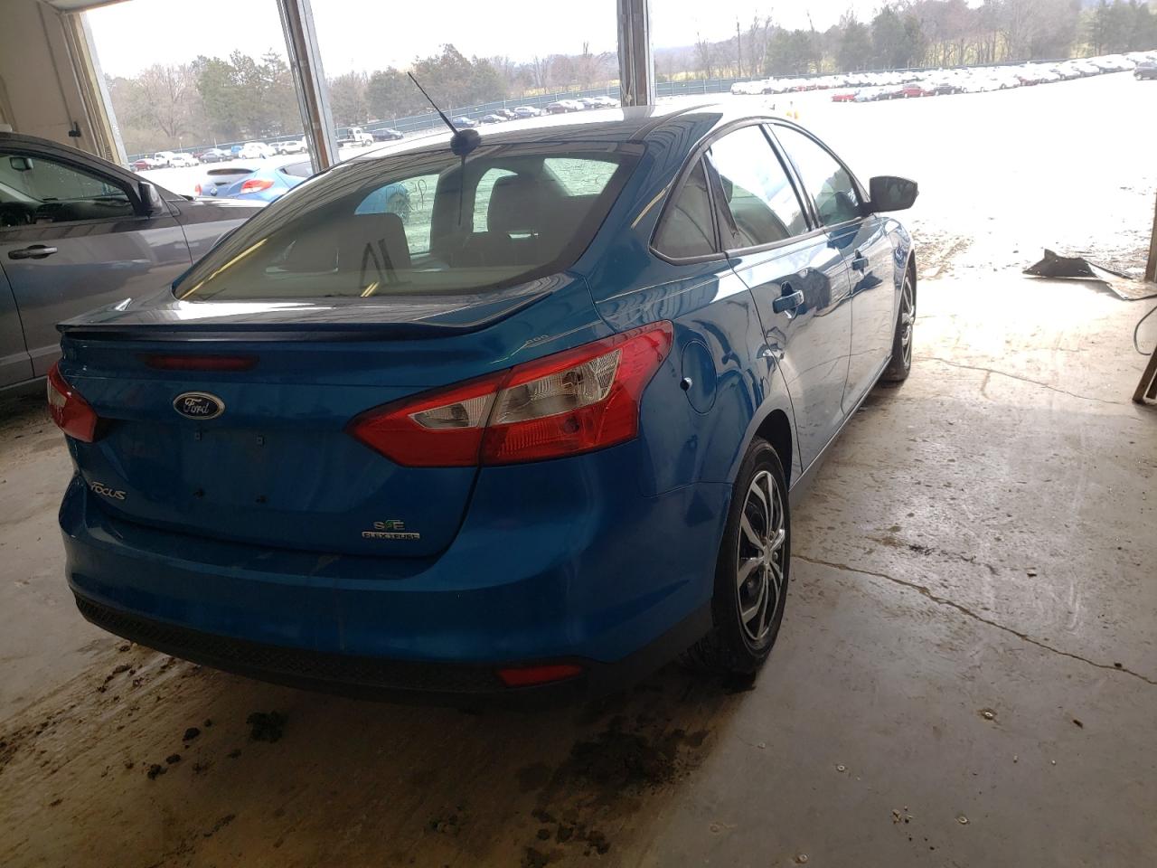 Photo 4 from auction – 2013 FORD FOCUS SE with VIN 1FADP3F28DL340238
