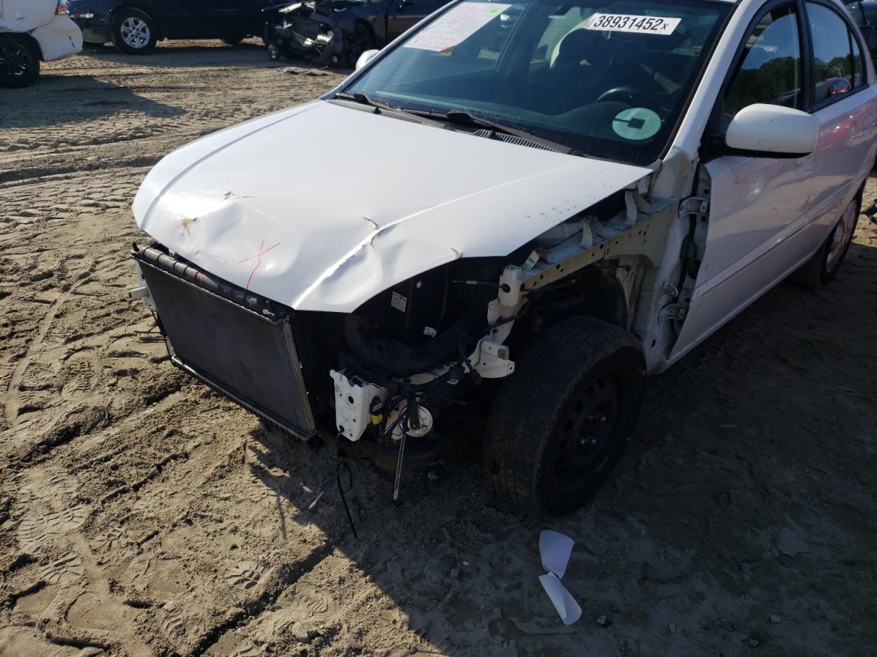 Photo 9 from auction – 2011 KIA RIO BASE with VIN KNADH4A31B6944753