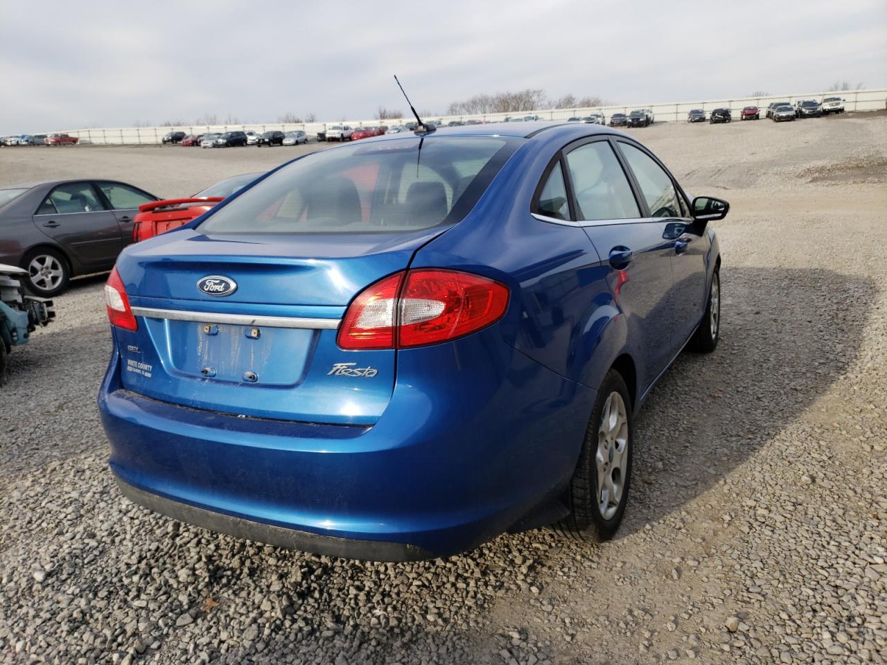 Photo 4 from auction – 2011 FORD FIESTA SEL with VIN 3FADP4CJ8BM143275
