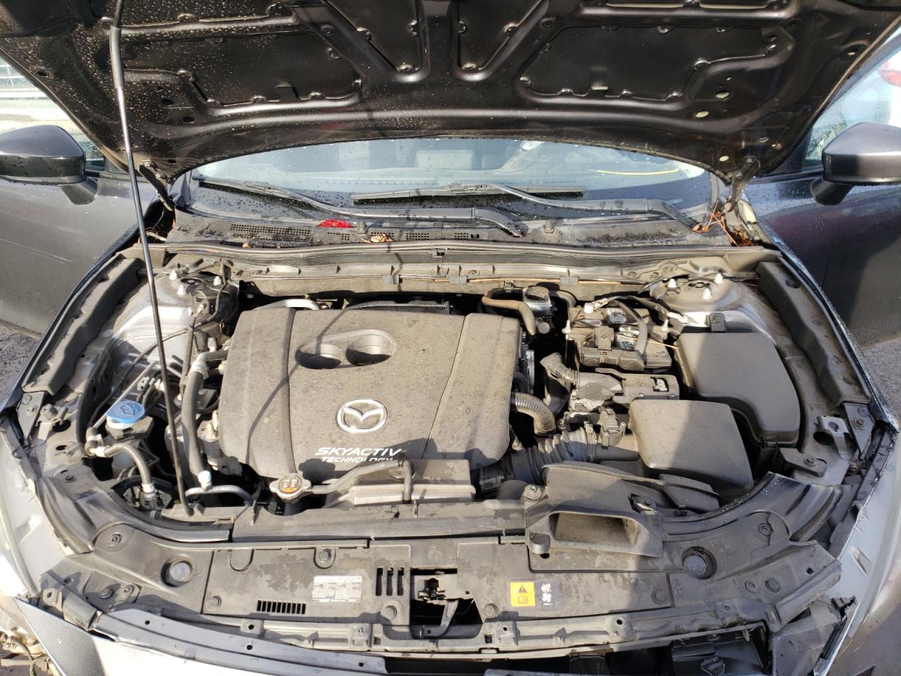 Photo 7 from auction – 2014 MAZDA 3 SV with VIN JM1BM1T73E1117567