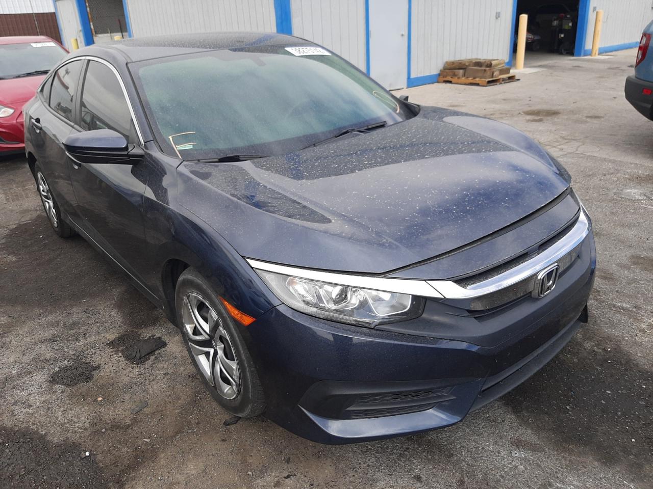 HONDA CIVIC LX 2017 with VIN 19XFC2F51HE202039 - Photo from auction