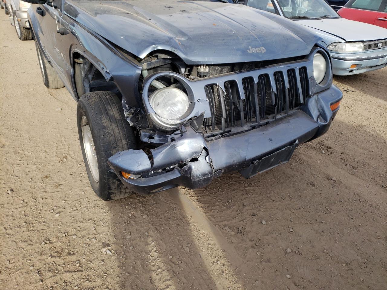 Photo 9 from auction – 2002 JEEP LIBERTY LI with VIN 1J8GL58K52W257589