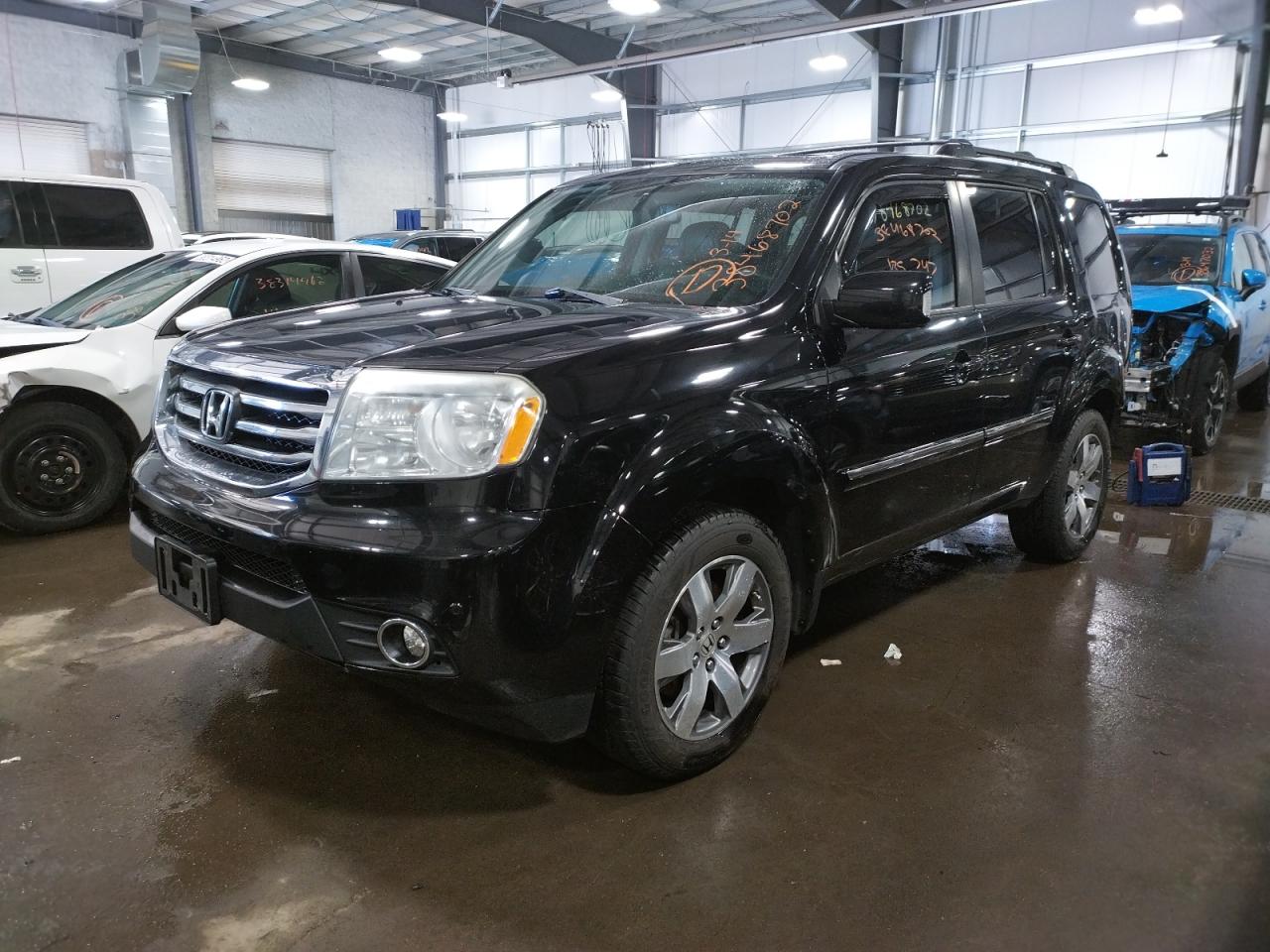 Photo 2 from auction – 2014 HONDA PILOT TOUR with VIN 5FNYF4H98EB006858