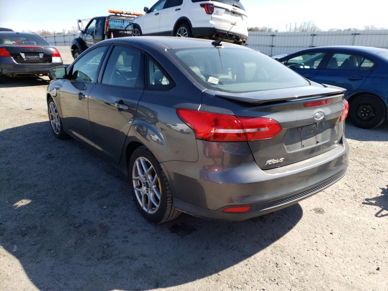 Photo 3 from auction – 2015 FORD FOCUS SE with VIN 1FADP3F2XFL252228