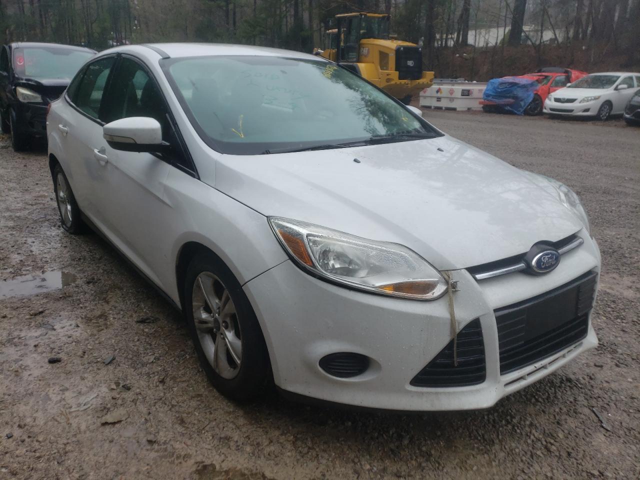 FORD FOCUS SE 2014 with VIN 1FADP3F28EL103122 - Photo from auction