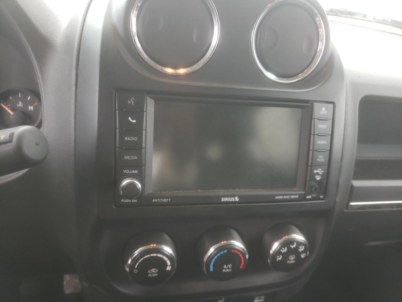 Photo 9 from auction – 2014 JEEP PATRIOT LA with VIN 1C4NJPFA8ED679978