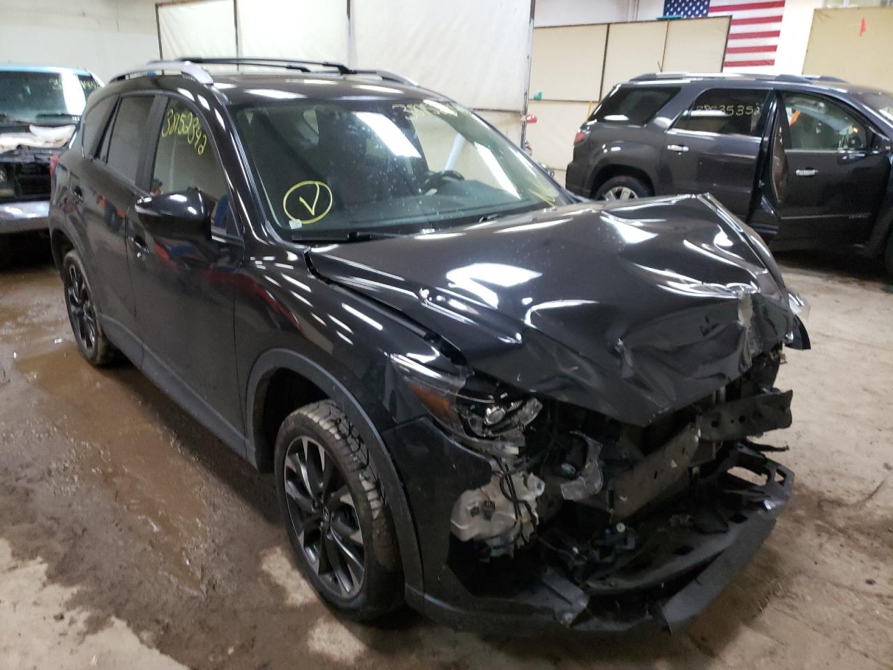 MAZDA CX-5 GT 2016 with VIN JM3KE4DY0G0716111 - Photo from auction