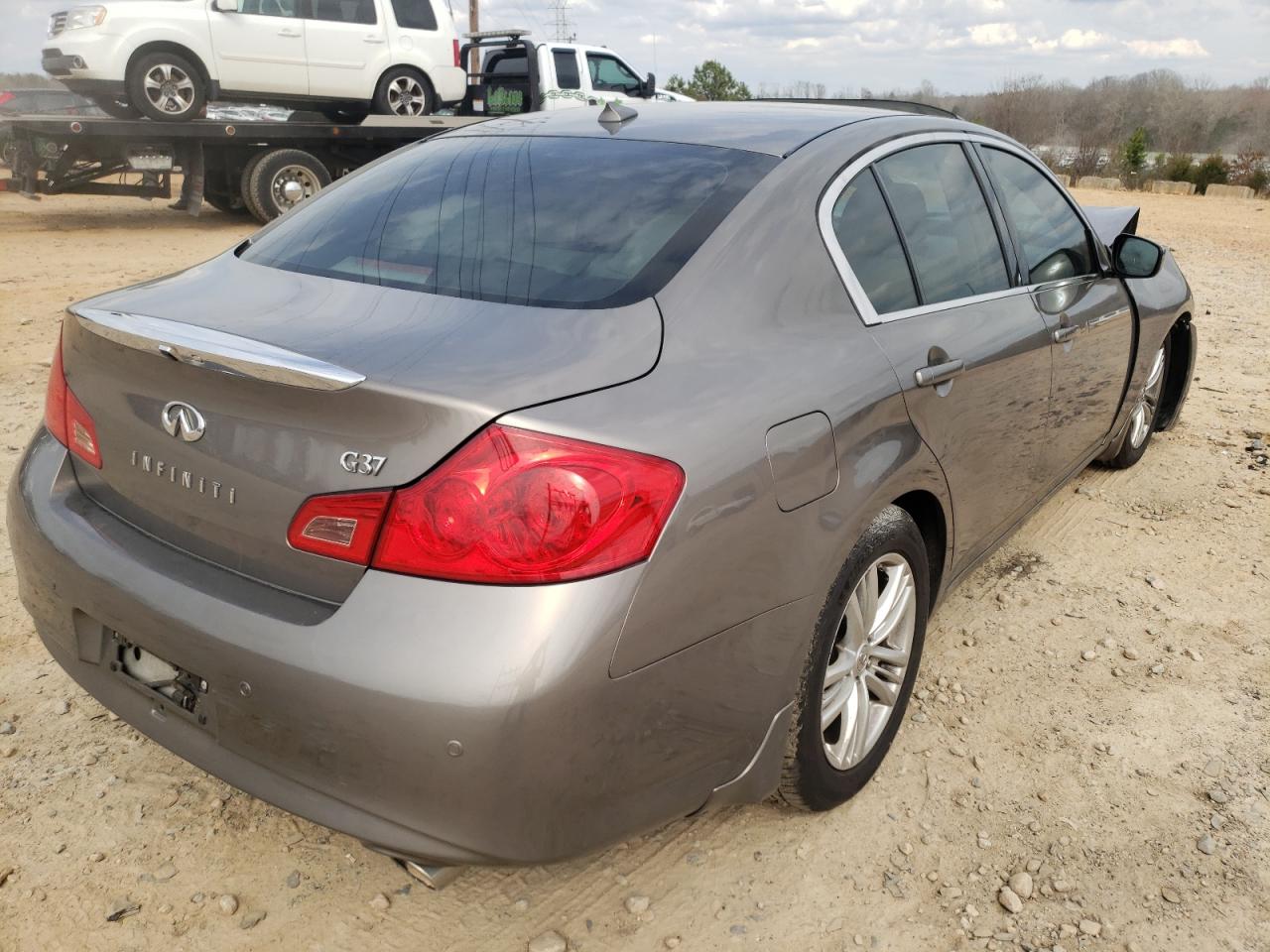 Photo 4 from auction – 2011 INFINITI G37 BASE with VIN JN1CV6APXBM505913