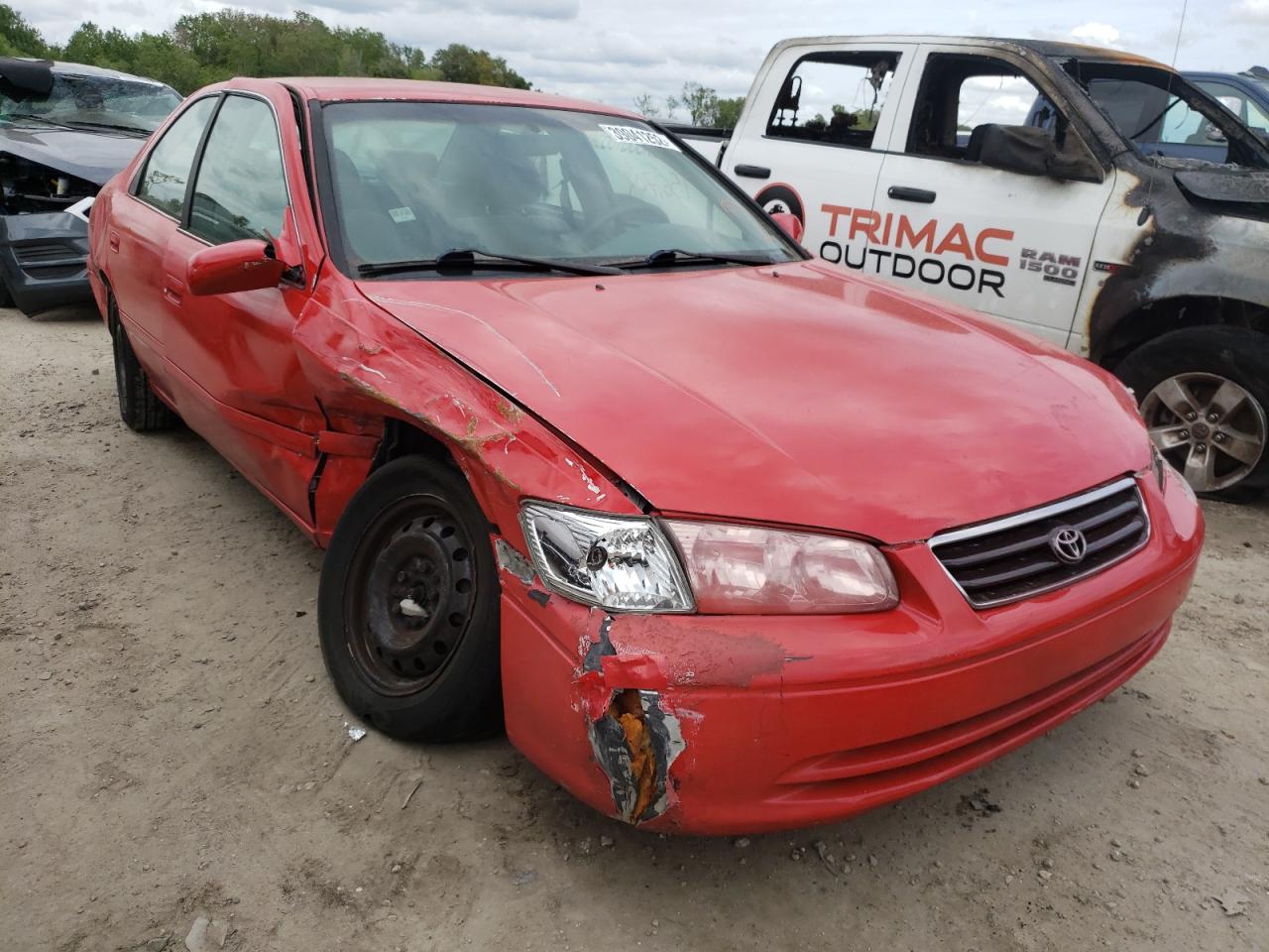 TOYOTA CAMRY CE 2000 with VIN 4T1BG22K6YU660784 - Photo from auction