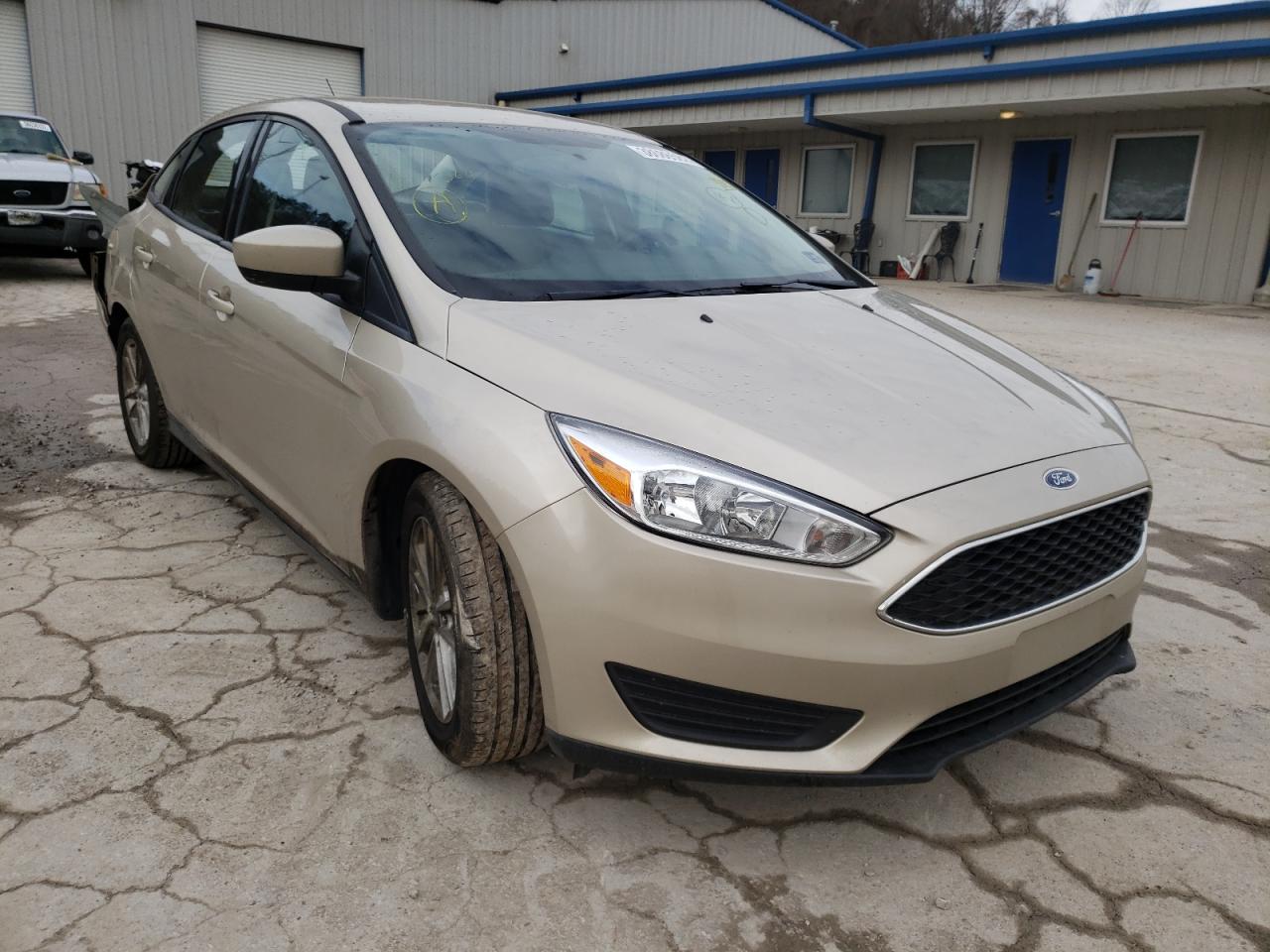 FORD FOCUS SE 2018 with VIN 1FADP3F25JL286232 - Photo from auction
