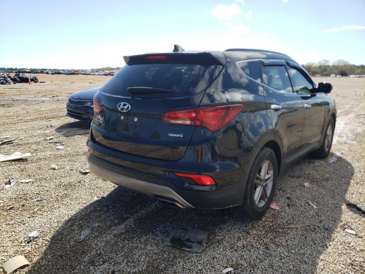 Photo 4 from auction – 2017 HYUNDAI SANTA FE S with VIN 5NMZU3LB3HH029580