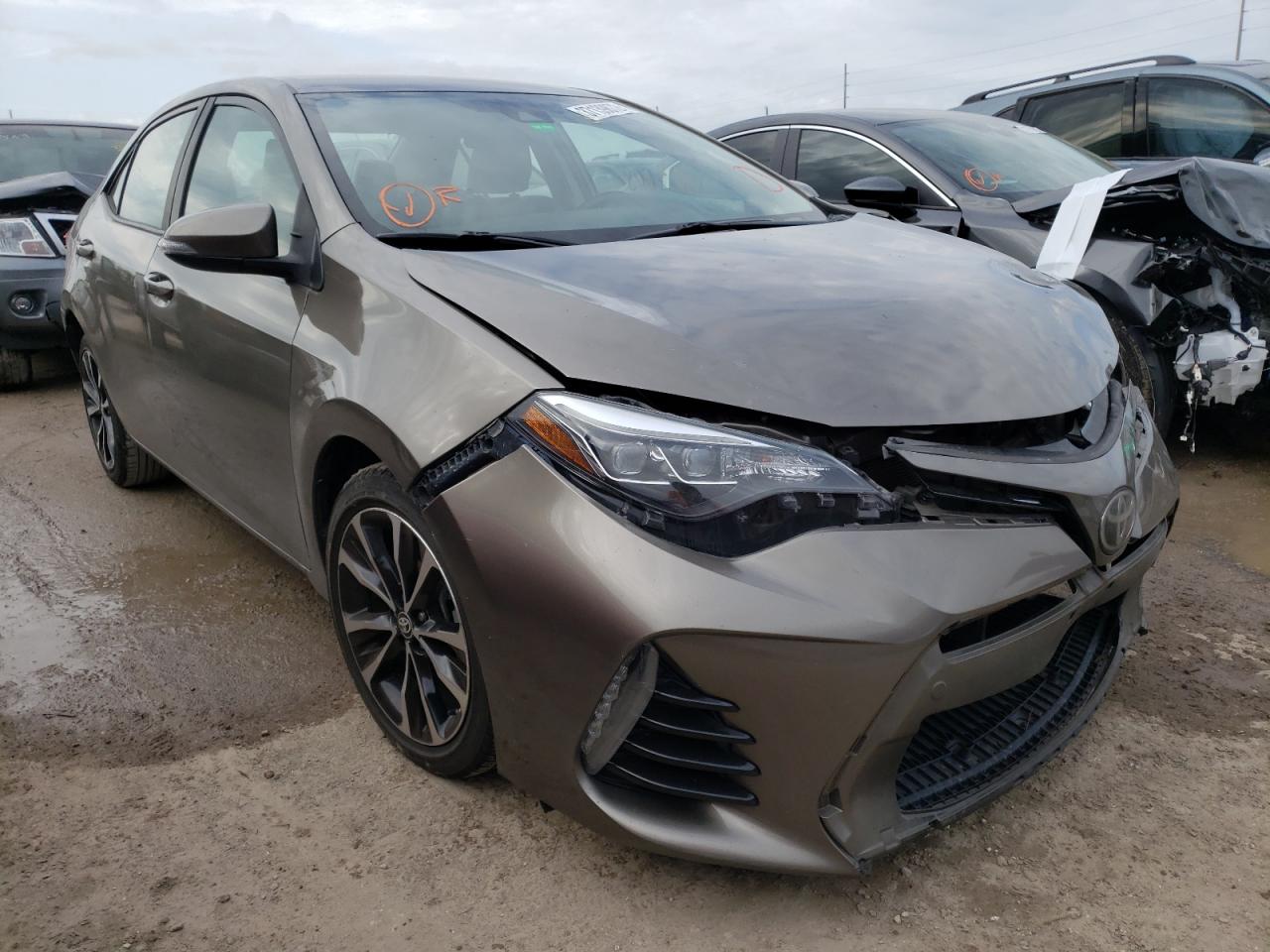 TOYOTA COROLLA L 2017 with VIN 5YFBURHE7HP660457 - Photo from auction