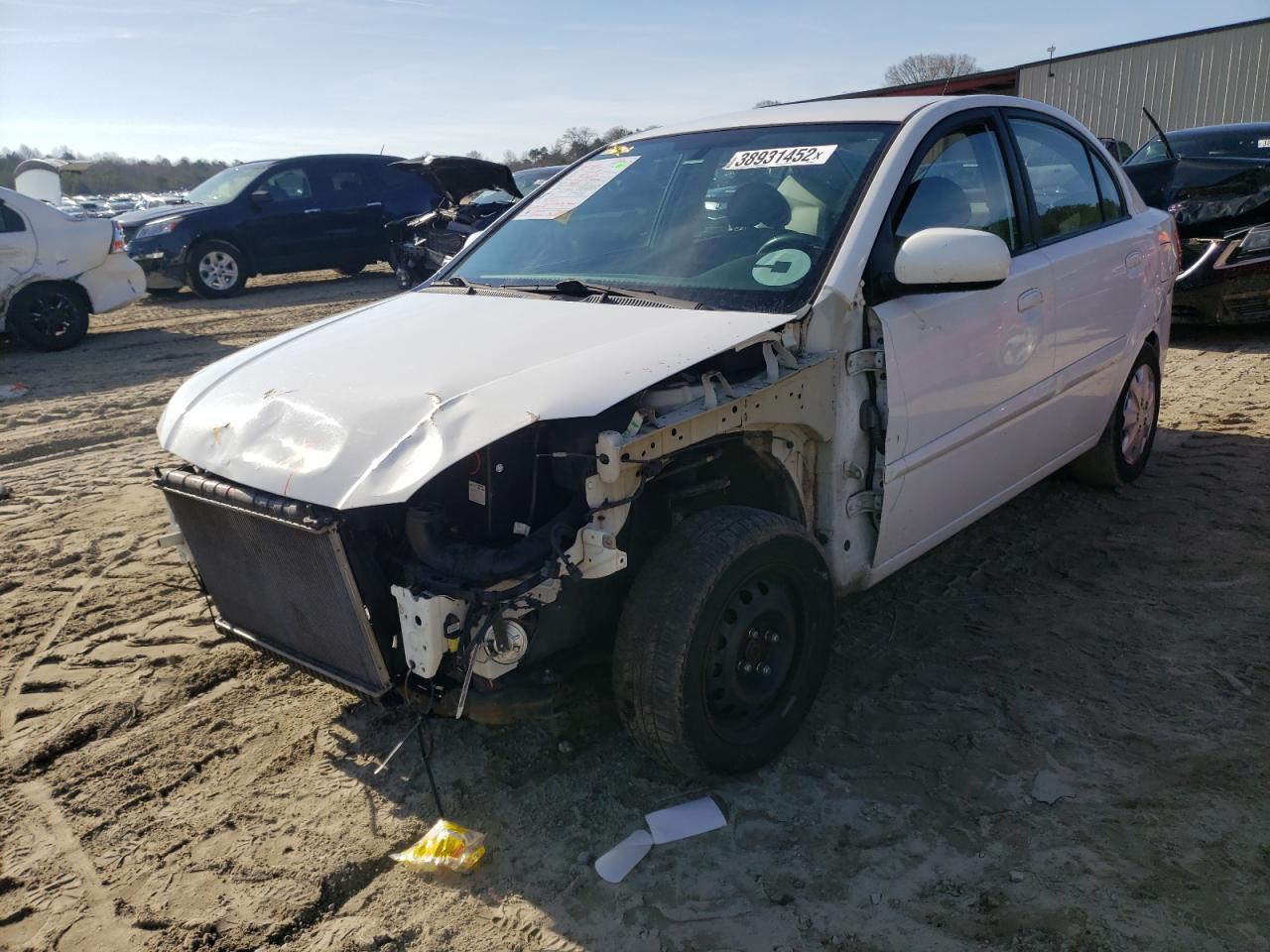 Photo 2 from auction – 2011 KIA RIO BASE with VIN KNADH4A31B6944753
