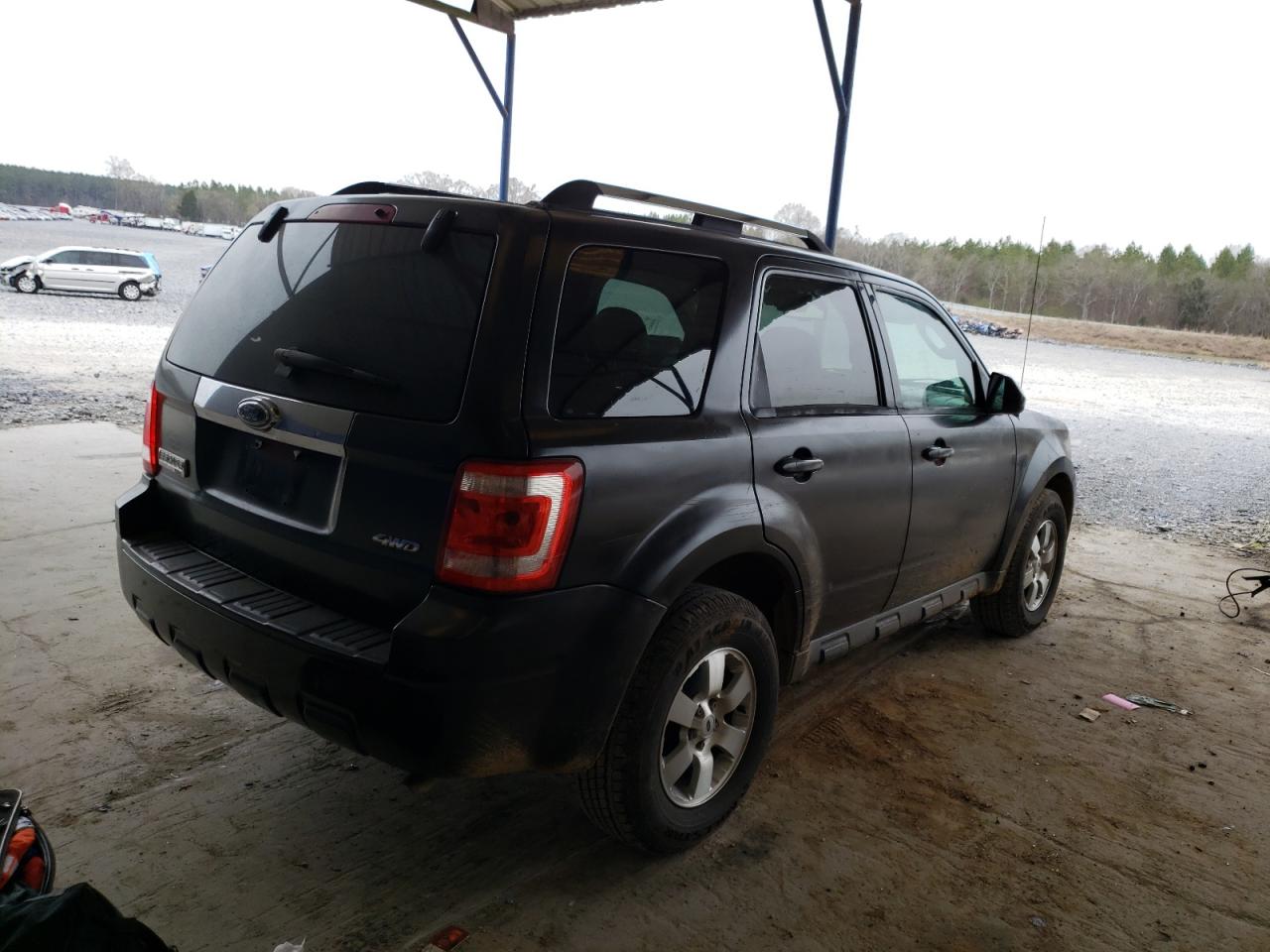 Photo 4 from auction – 2009 FORD ESCAPE LIM with VIN 1FMCU94779KD02122