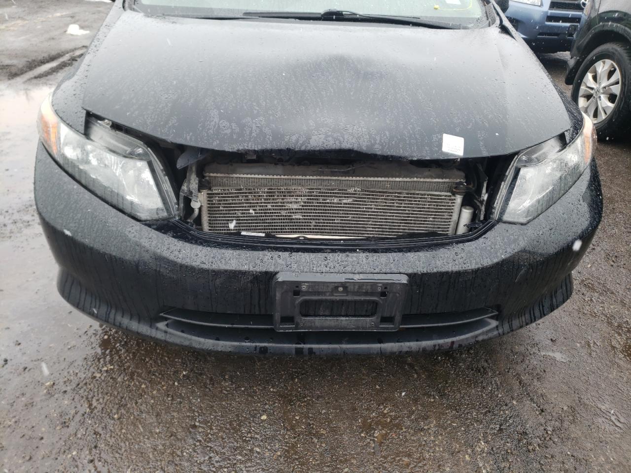 Photo 9 from auction – 2012 HONDA CIVIC LX with VIN 2HGFB2F47CH106148