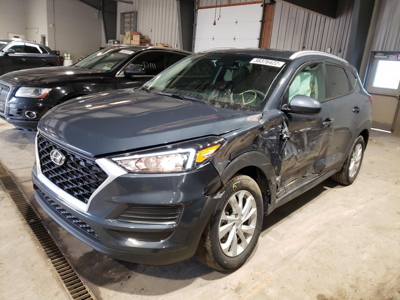 Photo 2 from auction – 2020 HYUNDAI TUCSON LIM with VIN KM8J3CA42LU176765