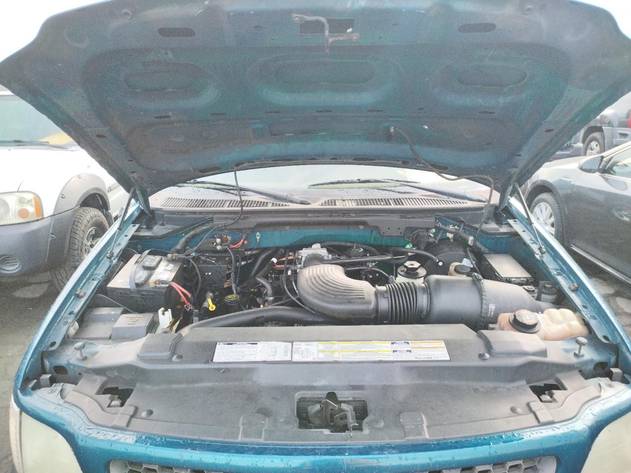 Photo 7 from auction – 2000 FORD F150 with VIN 1FTRX17LXYKA23682