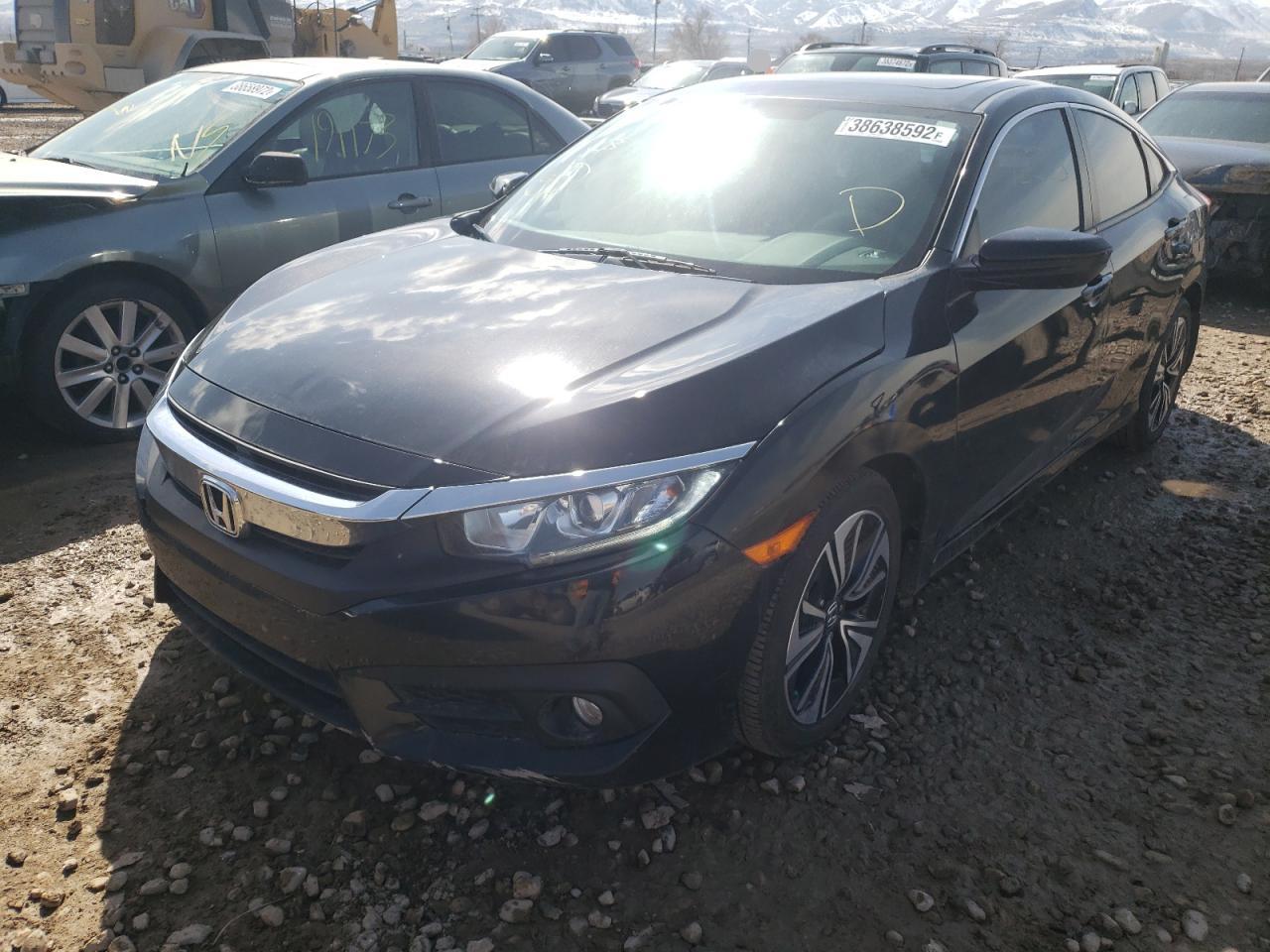 Photo 2 from auction – 2016 HONDA CIVIC EX with VIN 19XFC1F33GE041443