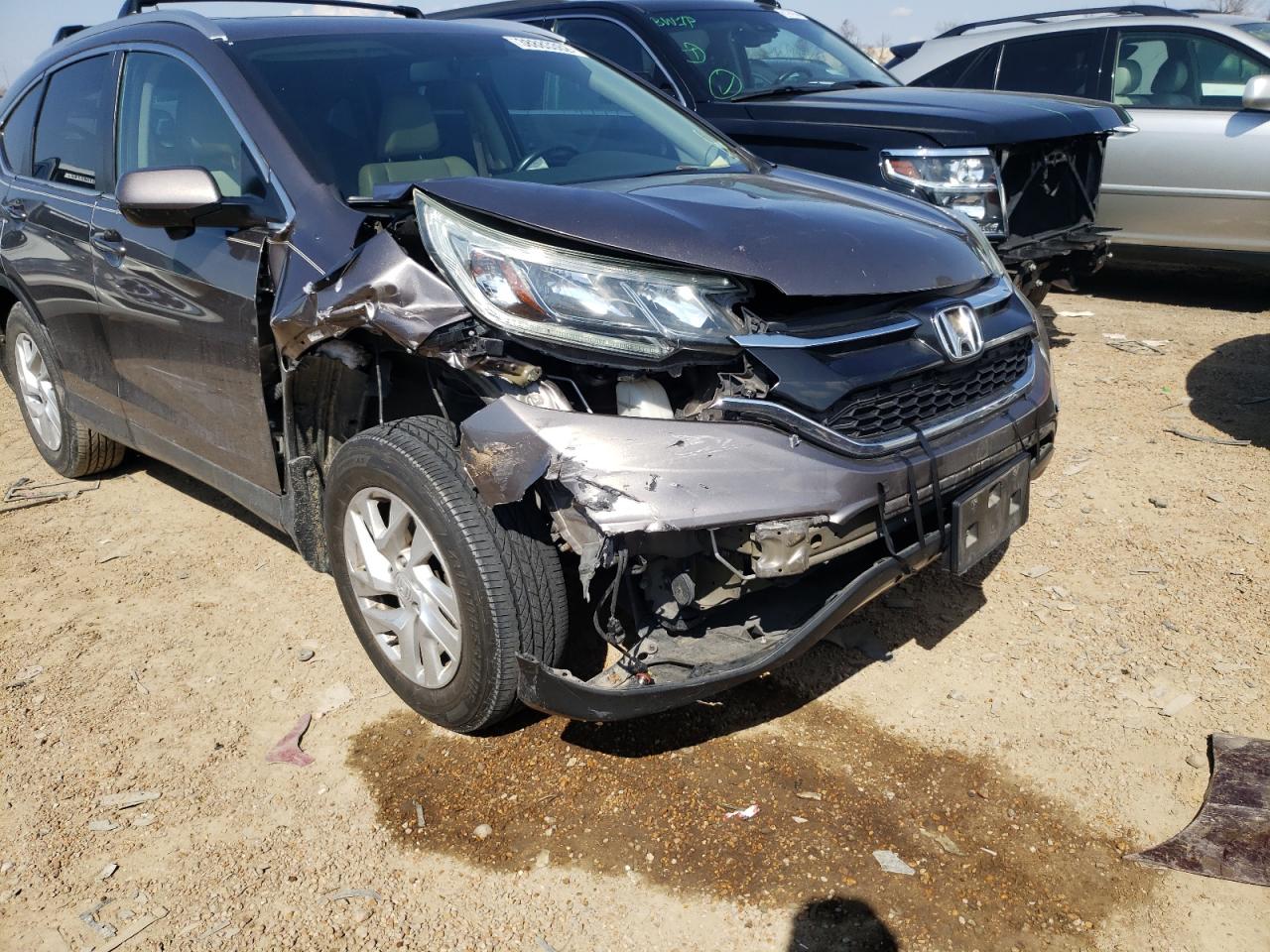Photo 9 from auction – 2015 HONDA CR-V EXL with VIN 5J6RM4H73FL039039