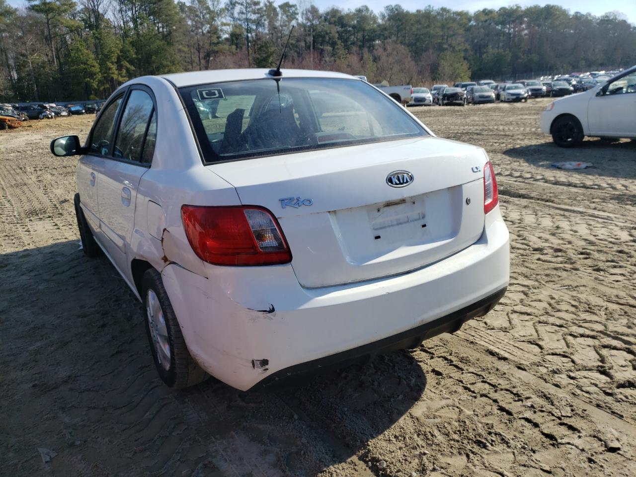 Photo 3 from auction – 2011 KIA RIO BASE with VIN KNADH4A31B6944753