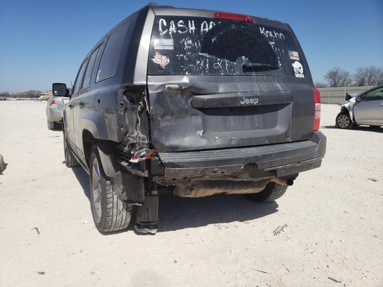 Photo 9 from auction – 2014 JEEP PATRIOT SP with VIN 1C4NJPBB4ED857061