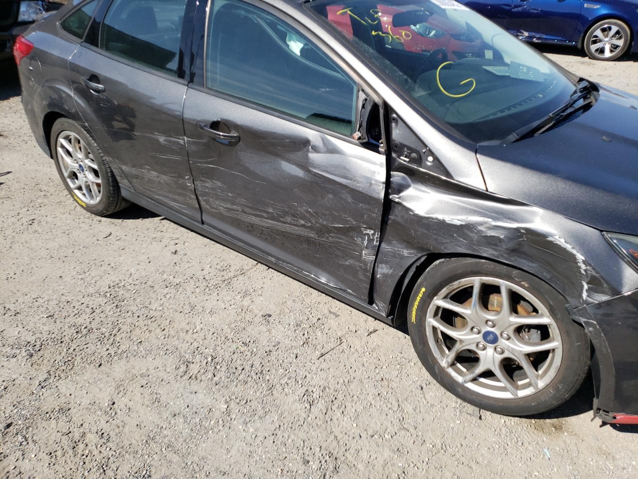 Photo 9 from auction – 2015 FORD FOCUS SE with VIN 1FADP3F2XFL252228