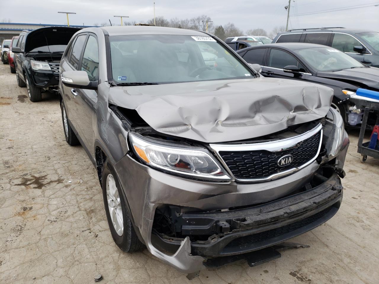 KIA SORENTO LX 2014 with VIN 5XYKTCA62EG467488 - Photo from auction