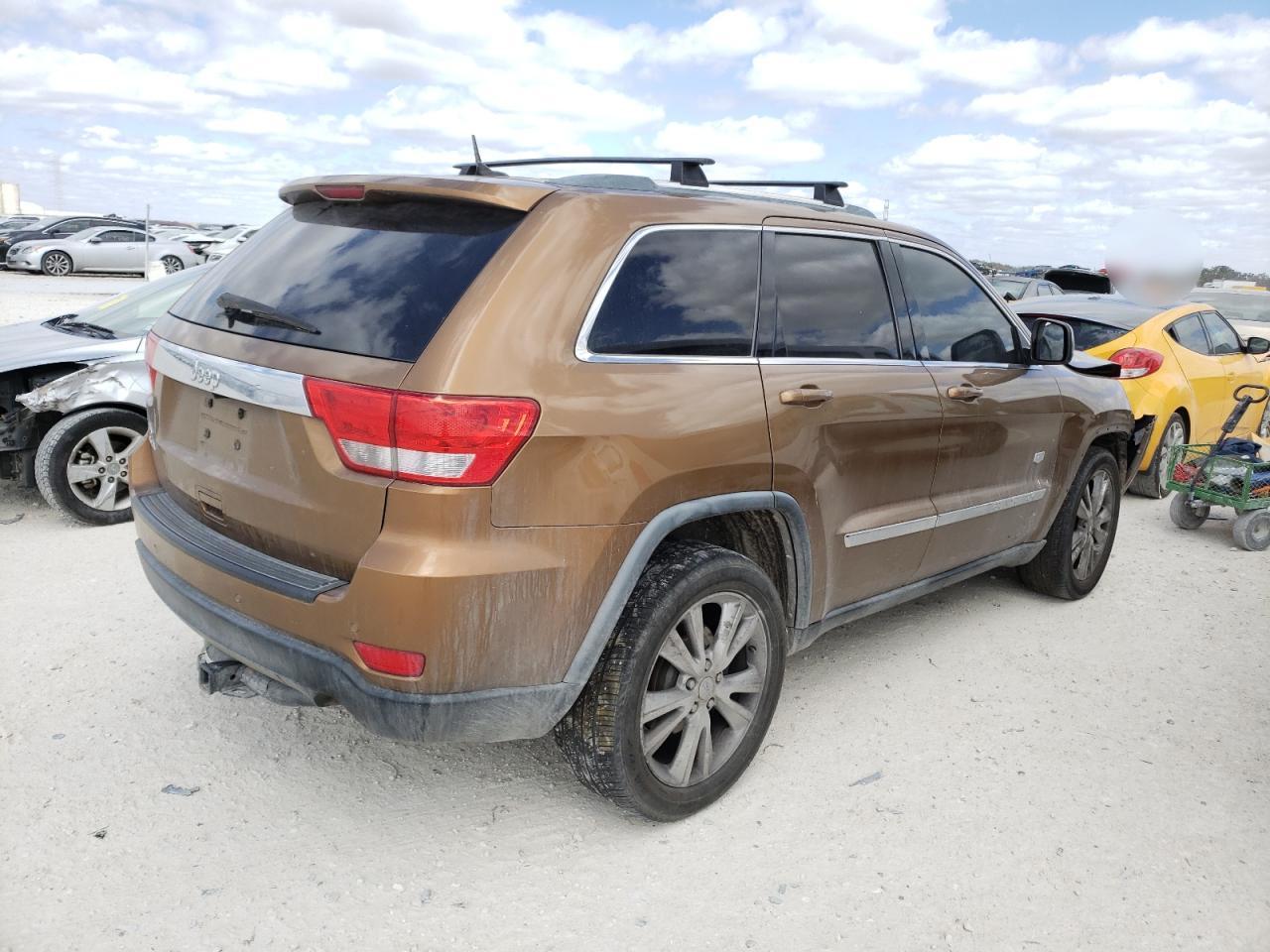 Photo 4 from auction – 2011 JEEP GRAND CHER with VIN 1J4RR4GG9BC645782
