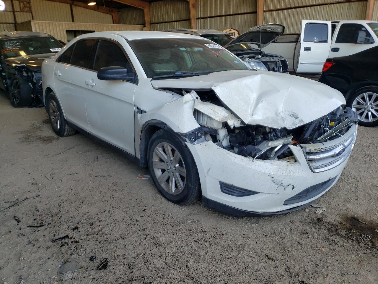 FORD TAURUS SE 2012 with VIN 1FAHP2DWXCG111293 - Photo from auction