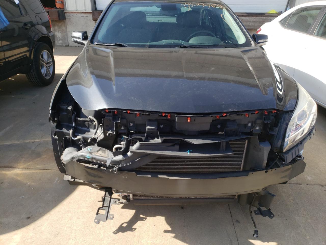 Photo 9 from auction – 2014 CHEVROLET MALIBU 1LT with VIN 1G11C5SL1EF265006
