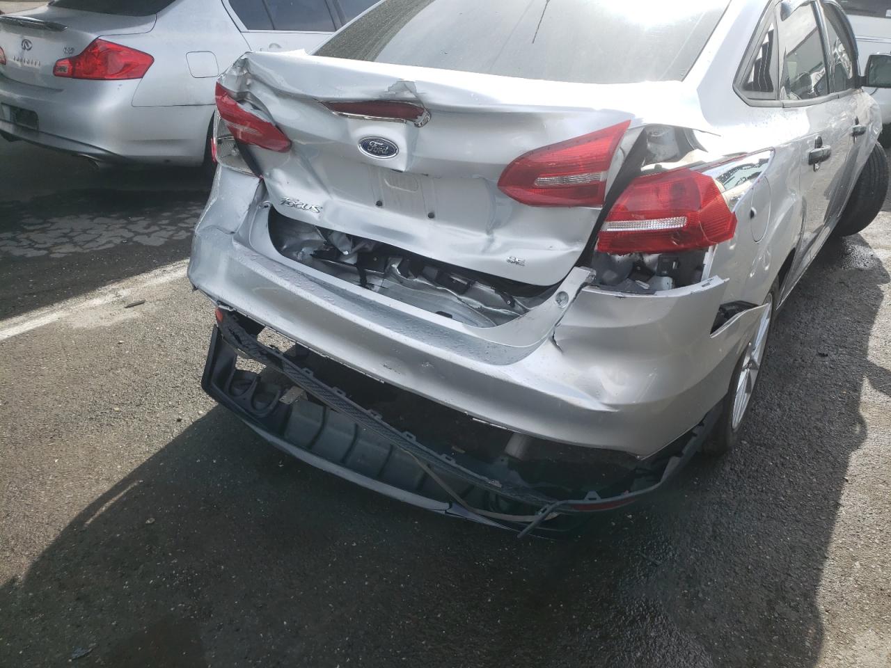 Photo 9 from auction – 2015 FORD FOCUS SE with VIN 1FADP3F29FL301564
