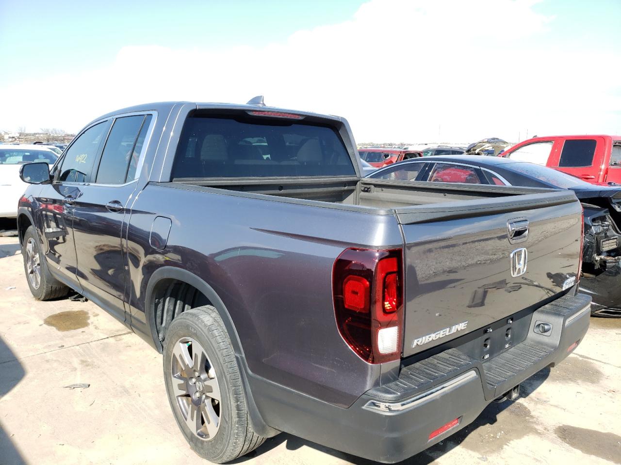 Photo 3 from auction – 2018 HONDA RIDGELINE with VIN 5FPYK3F50JB008966