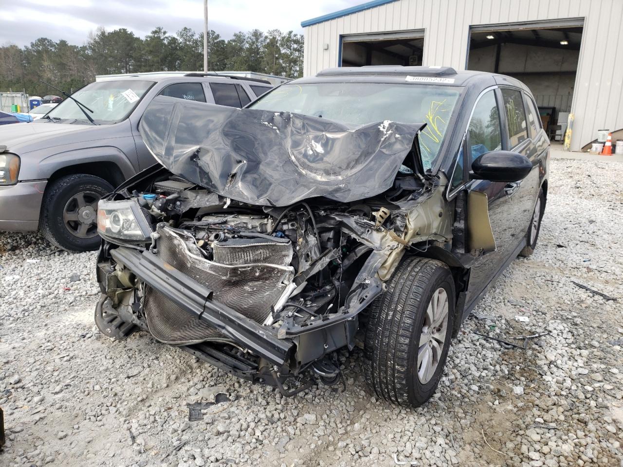 Photo 2 from auction – 2015 HONDA ODYSSEY EX with VIN 5FNRL5H69FB008659