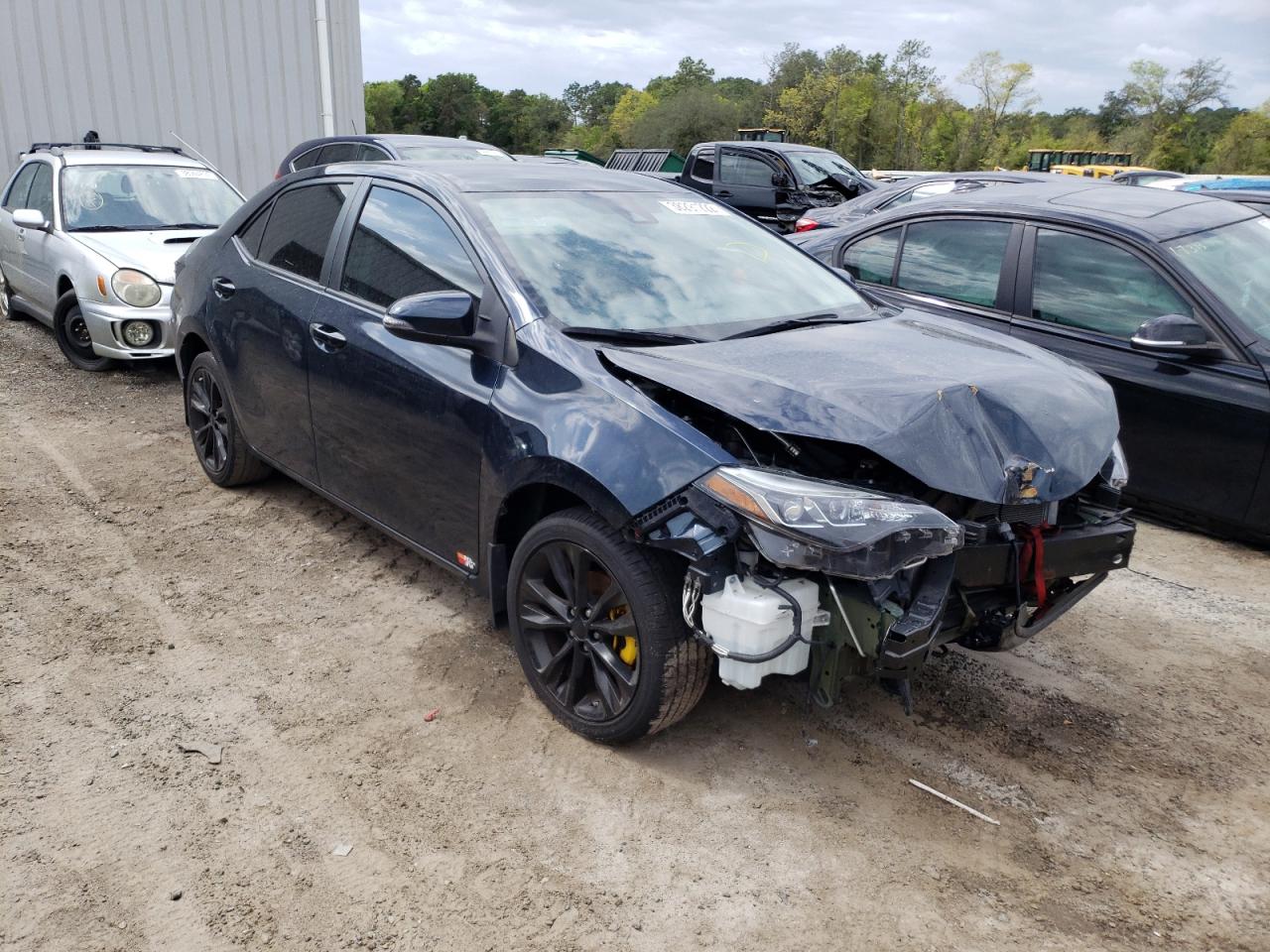 TOYOTA COROLLA 2018 with VIN 5YFBURHE3JP825216 - Photo from auction