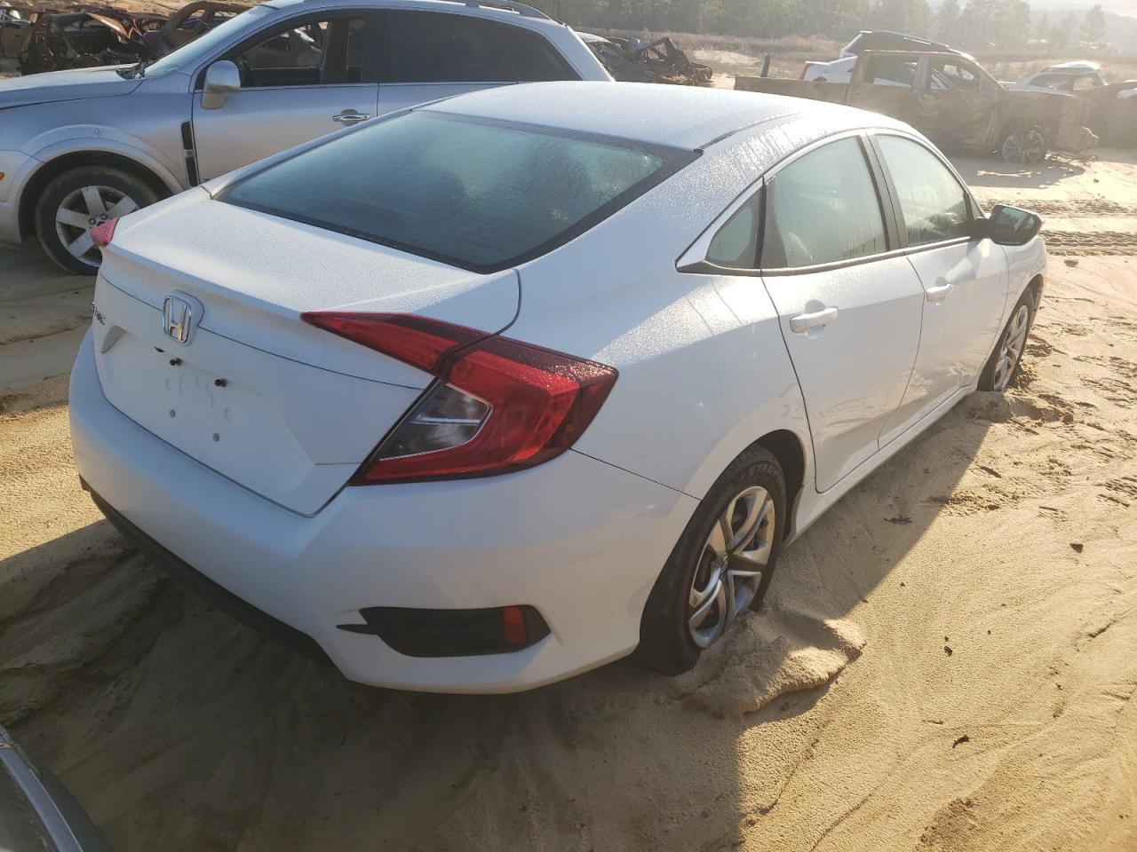 Photo 4 from auction – 2017 HONDA CIVIC LX with VIN 19XFC2F52HE040860
