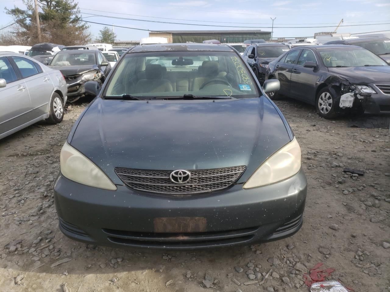 Photo 9 from auction – 2004 TOYOTA CAMRY LE with VIN 4T1BE32K84U348892