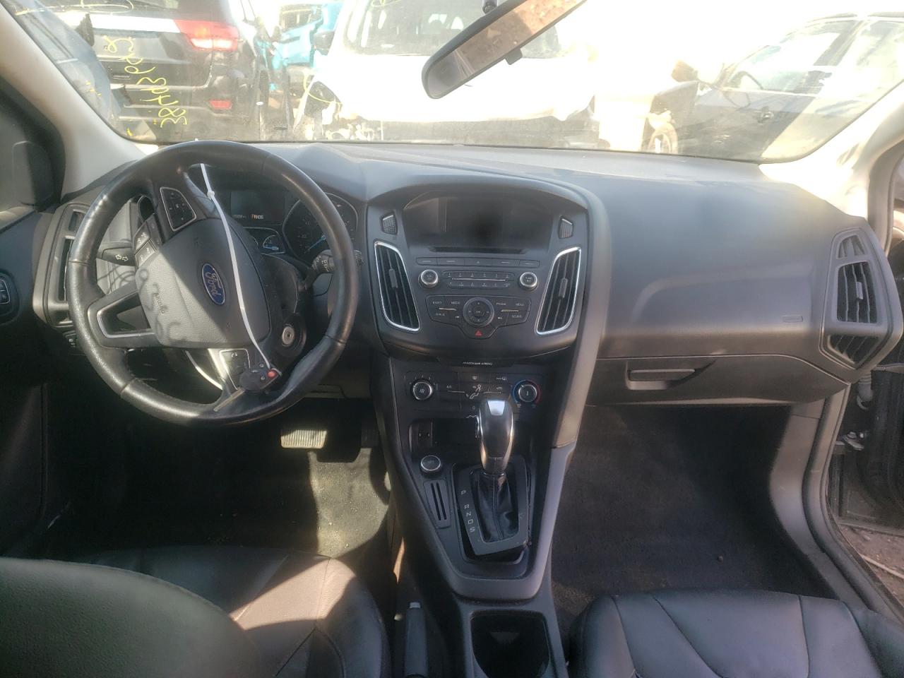 Photo 9 from auction – 2016 FORD FOCUS SE with VIN 1FADP3K21GL299557