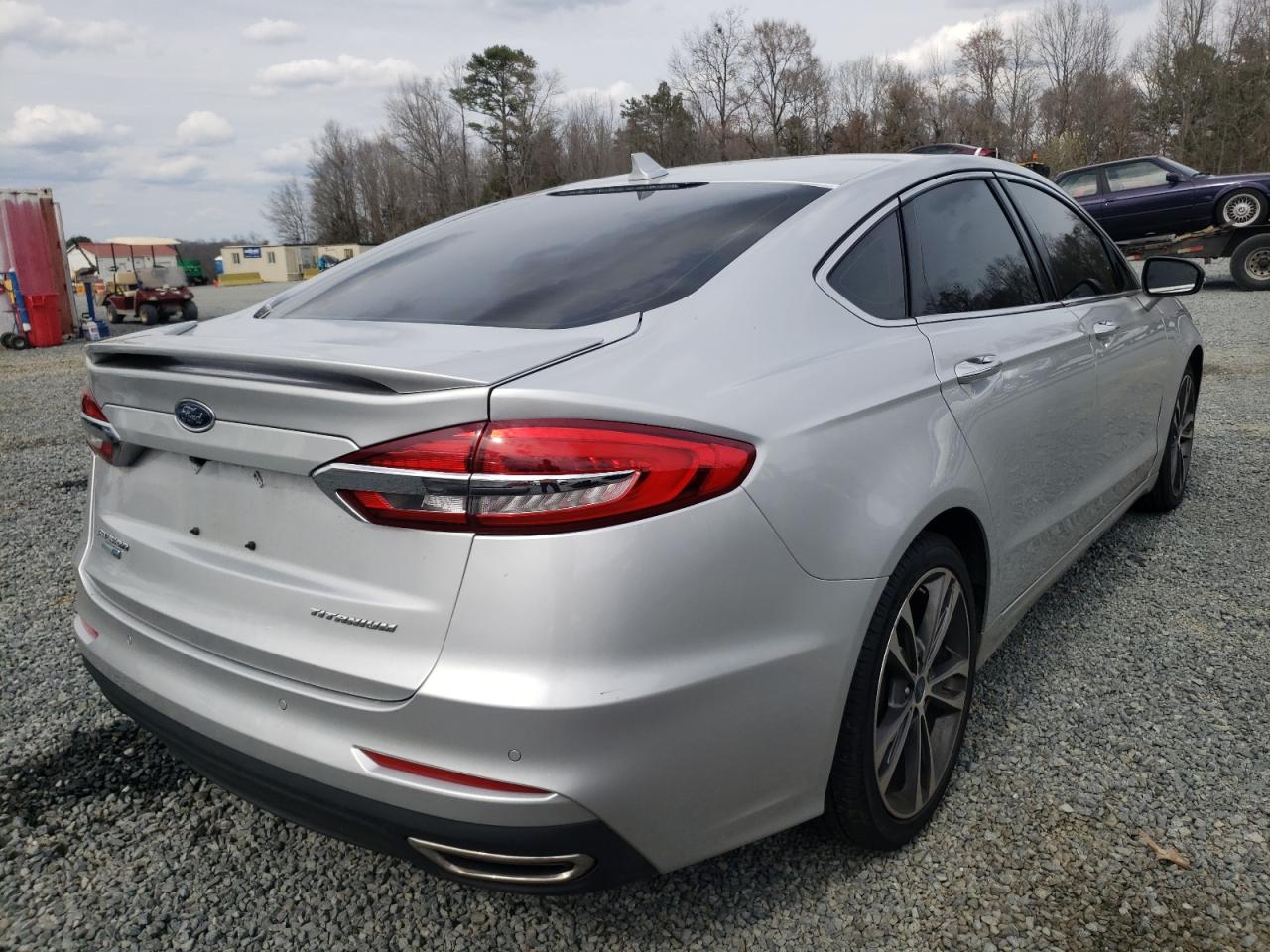 Photo 4 from auction – 2019 FORD FUSION TIT with VIN 3FA6P0D94KR184818